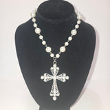 Pearlescent beaded double necklace with cross pendant