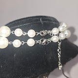Pearlescent beaded double necklace with cross pendant