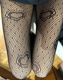 Fishnet tights with heart detail