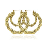 Gia Monet Large bamboo earrings gold and rose gold colors double hoop