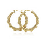 Gia Monet Large bamboo earrings gold and rose gold colors double hoop