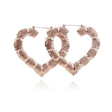 Gia Monet Large bamboo earrings gold and rose gold colors heart