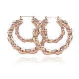 Gia Monet Large bamboo earrings gold and rose gold colors double hoop