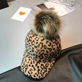 Gia Monet Cheetah leopard animal print snapback with faux fur pom pom puff